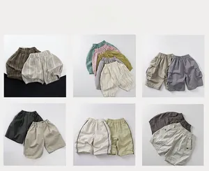 Detailed grid view of assorted kids cotton linen shorts in beige green and khaki colors