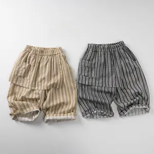 Detail view of cotton-linen striped kids pants with elastic waist and large side pockets