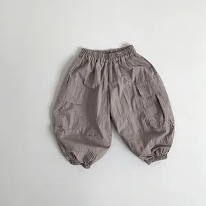 Detail view of toddler cargo pants showing breathable fabric texture and elastic waistband