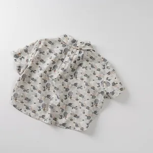 Kids short sleeve cotton shirt with abstract pebble print and small lapel collar