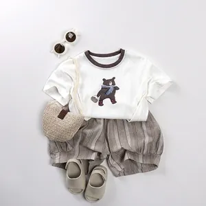 Kids summer cotton outfit with white bear t-shirt and brown checkered shorts set