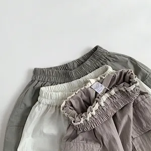Lightweight breathable cargo pants for toddlers in olive green, cream white and taupe gray