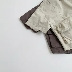 Kids cotton short sleeve utility shirts in beige and dark coffee with flap pockets