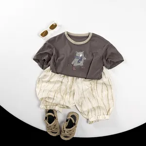 Kids short sleeve set featuring dark grey bear print T-shirt and beige striped wide-leg pants