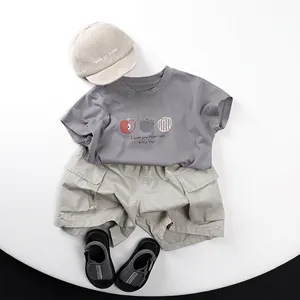 Kids casual summer outfit set with grey printed t-shirt and khaki cargo shorts