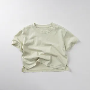 Detail view of cotton t-shirt with side split hem and minimalist knit texture