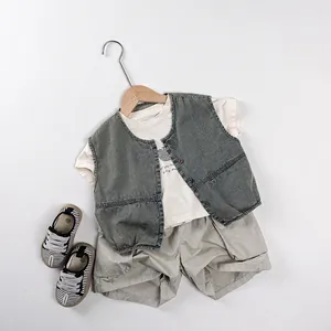 Casual children clothing set featuring a washed denim vest with a white printed t-shirt