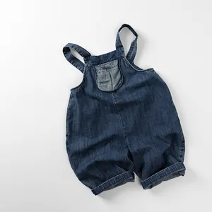 Salopette en jean bleu foncé pour enfants avec ourlet roulé et poche avant ronde