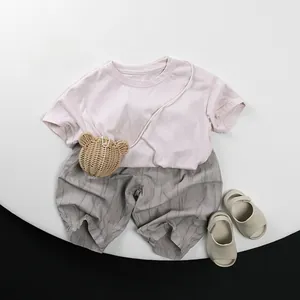 Toddler summer set with pink cotton T-shirt, grey textured shorts and cute bear crossbody bag