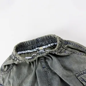 Retro wash denim shorts with elastic waistband for kids shown from a top view
