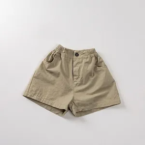 Detailed view of kids cotton linen khaki shorts with elastic waist and side pockets
