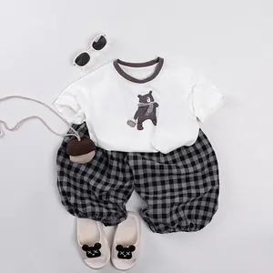 Kids summer set with white cartoon bear t-shirt and grey checkered harem pants