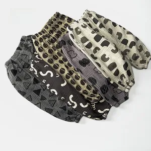 Detail of multi-pattern cotton gauze toddler mosquito pants with elastic cuffs