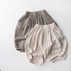 Close-up of breathable cotton gauze fabric texture on toddler mosquito pants