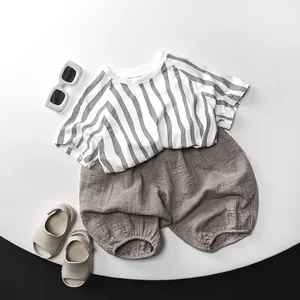 Kids cotton striped t-shirt and grey bloomer shorts summer outfit set with sunglasses