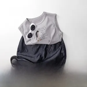 Summer kids cooling outfit with grey penguin tank top and navy blue casual shorts