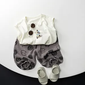 Kids summer cotton linen set featuring beige puppy vest and grey printed wide-leg pants