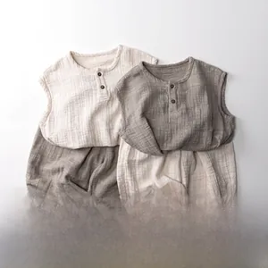Detailed macro of breathable cotton-linen baby summer vest and pumpkin shorts set