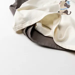 Débardeur enfant minimaliste en coton avec imprimé chien en crème et marron