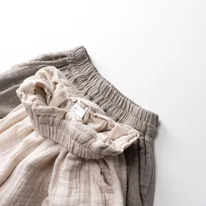 Toddler cotton gauze wide-leg mosquito pants in beige and taupe waffle texture