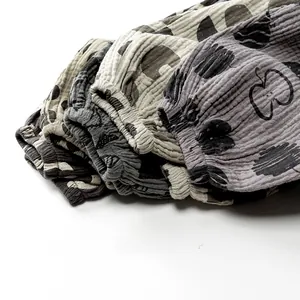 Close-up of breathable double-layer cotton gauze fabric with cute printed patterns