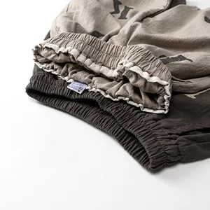 Shorts décontractés en coton pour enfants avec taille élastique et imprimé de lettres