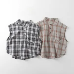 Detailed view of plaid sleeveless shirts with small mandarin collar and chest pocket