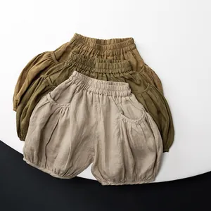 Détails de bloomers en lin pour enfants avec taille élastique et texture respirante