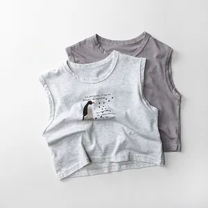 Detailed flat lay of two cotton sleeveless t-shirts in grey and purple with penguin print