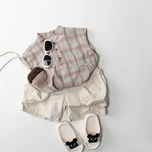 Kids plaid sleeveless shirt and beige casual shorts set for summer style outfit