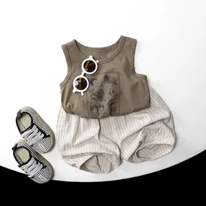 Kids vintage summer set with brown graphic tank top and off-white ribbed shorts