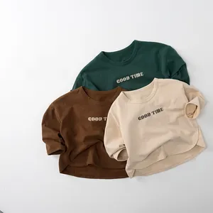 Détails de trois t-shirts enfant à manches longues en coton avec imprimé Good Time