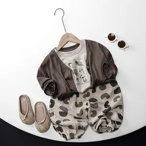 Neutral toddler knit cardigan set with mushroom print T-shirt and patterned pants
