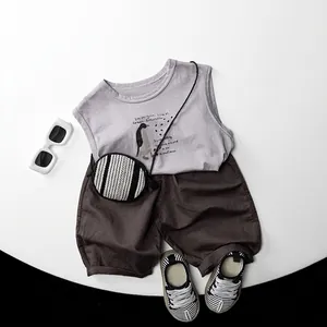 Kids linen cotton summer outfit set with grey penguin tank top and brown casual shorts