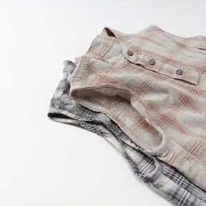 Children's sleeveless plaid cotton shirts in grey and orange for a minimalist look