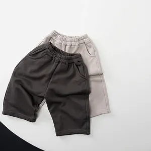 Pantaloni sportivi in cotone per bambini in grigio scuro e chiaro con vita elastica