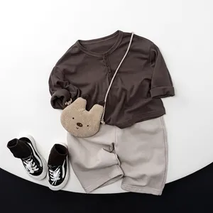 Kids cotton autumn outfit with dark coffee long sleeve Henley shirt and grey casual trousers