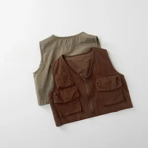 Detail of V-neck kids utility vests with functional multi-pockets and zipper closure