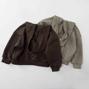 Detail of ribbed cuffs and soft cotton fabric on autumn hooded kids sweaters