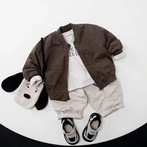 Kids autumn workwear set with brown jacket, white tee and beige cargo shorts