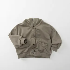Detail view of olive green hooded knit jacket for kids with button closure and ribbed cuffs