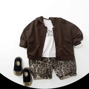 Autumn kids knit jacket set with brown hoodie, white tee, and leopard shorts in Korean style