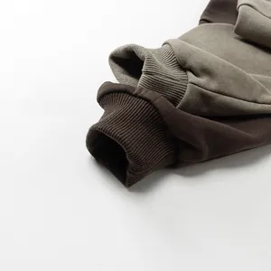 Detail of ribbed cuffs on heavy cotton autumn jackets in dark brown and gray-brown colors