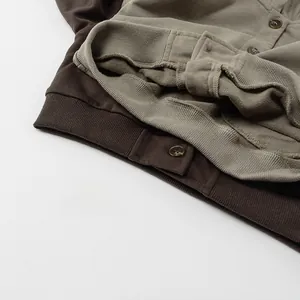 Close-up of knit fabric texture with buttons and ribbed cuffs on kids cardigan