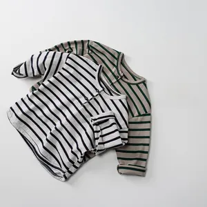 Detail view of cotton striped long sleeve t-shirts with button collar in black and olive