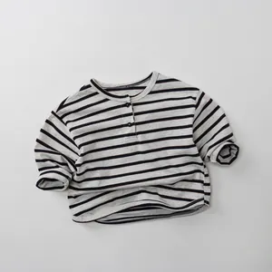 Detailed close-up of multi-colored striped cotton Henley shirt with button neckline