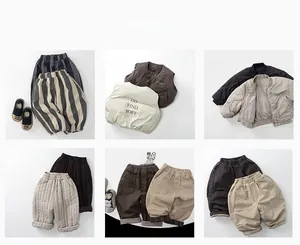 Flat lay of earth-toned children's quilted jackets and warm vests for winter styling