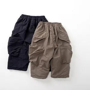 Kids warm cargo pants in navy blue and khaki with elastic waist and large pockets