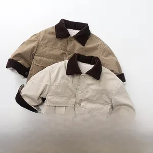 Detail of fleece-lined kid's jackets with corduroy collar and cozy lamb wool lining
