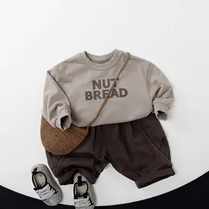 Kids casual long-sleeve sweatshirt and pants set with Nut Bread print in earthy brown tones